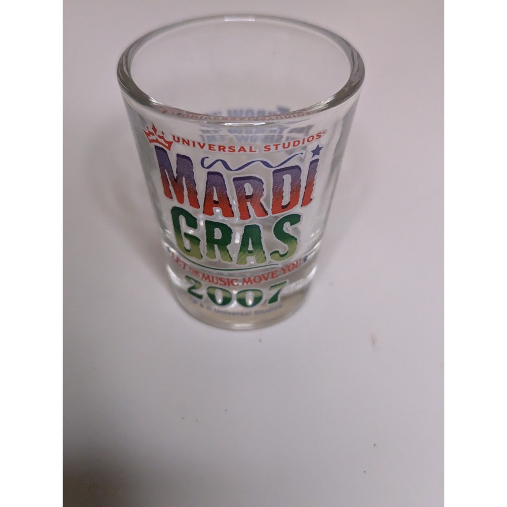 Univeral studios Mardi Gras 2007 You throw em I'll show em shot glass souvenir